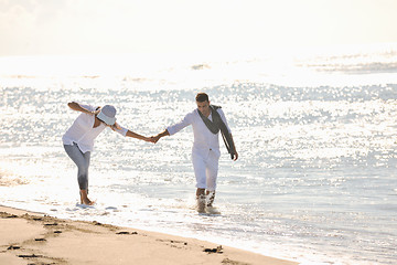 Image showing happy young couple have fun at beautiful beach