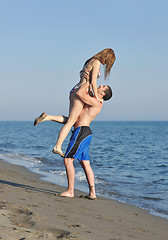 Image showing happy young couple have romantic time on beach