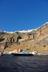 Image showing santorini island coast with luxury yacht