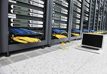 Image showing laptop computer at server network room