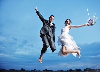 Image showing romantic beach wedding at sunset