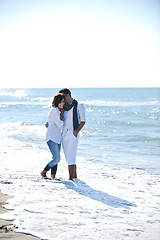 Image showing happy young couple have fun at beautiful beach