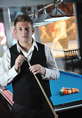 Image showing young man play pro billiard game 