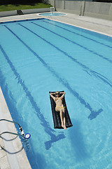 Image showing woman relax on swimming pool