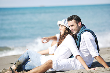 Image showing happy young couple have fun at beautiful beach