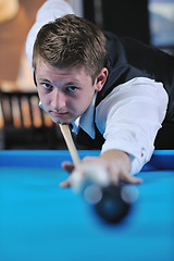 Image showing young man play pro billiard game 