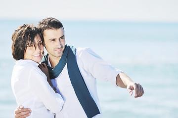 Image showing happy young couple have fun at beautiful beach