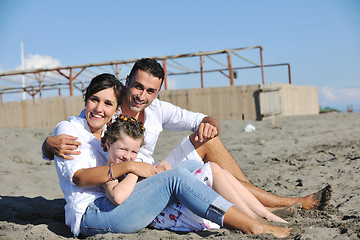 Image showing happy young  family have fun on beach