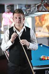 Image showing young man play pro billiard game 