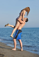 Image showing happy young couple have romantic time on beach