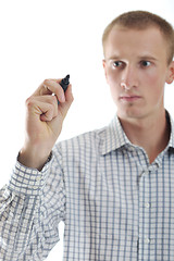 Image showing handsome young business man touching screen isolated