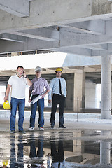 Image showing Team of architects on construciton site