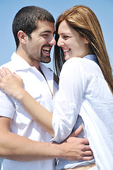 Image showing happy young couple have fun on beach