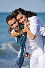 Image showing happy young couple have fun at beautiful beach