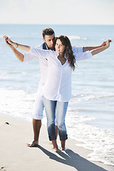 Image showing happy young couple have fun at beautiful beach