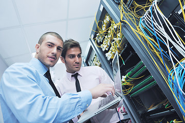 Image showing it engineers in network server room