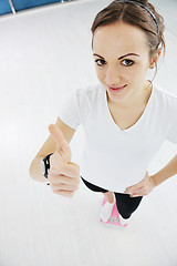 Image showing happy diet concept with young woman on pink scale