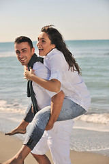 Image showing happy young couple have fun at beautiful beach