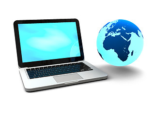 Image showing Gloving globe with laptop