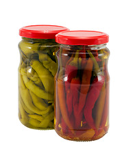 Image showing Ecologic peppers preserve in glass pots isolated 