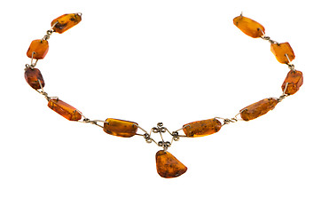 Image showing Amber gold color stone necklace isolated on white 