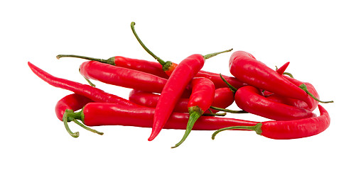 Image showing Pile natural red chilli peppers paprika on white 