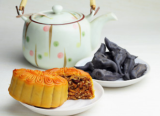 Image showing Moon cake with tea and water caltrop