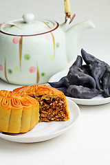 Image showing Moon cake with tea and water caltrop
