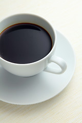 Image showing cup of coffee on white