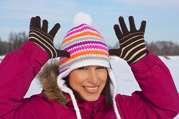 Image showing Smiling girl making funny faces