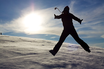 Image showing Jumping in snow