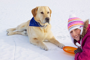 Image showing Girl with her dog in winter