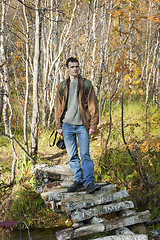 Image showing Tourist  on a bridge