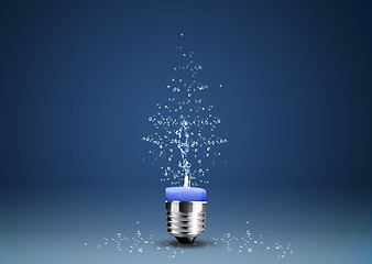 Image showing Wax candle into lighting bulb with water splashes