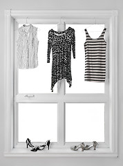 Image showing Clothes hanging in the window