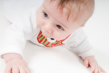 Image showing Closeup portrait of baby in snowman costume