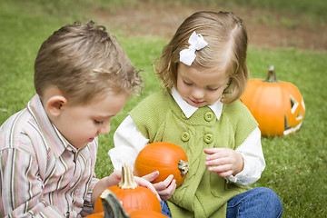 Image showing Cute Young Brother and Sister At the Pumpkin Patch