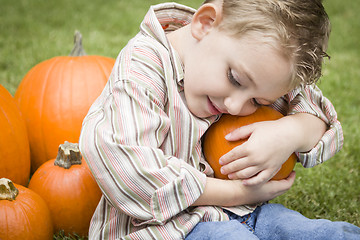 Image showing Cute Young Child Boy Enjoying the Pumpkin Patch.