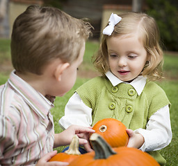 Image showing Cute Young Brother and Sister At the Pumpkin Patch