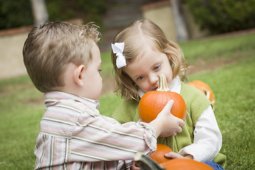 Image showing Cute Young Brother and Sister At the Pumpkin Patch