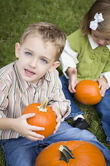 Image showing Cute Young Brother and Sister At the Pumpkin Patch