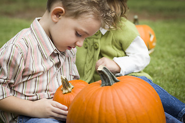 Image showing Cute Young Brother and Sister At the Pumpkin Patch