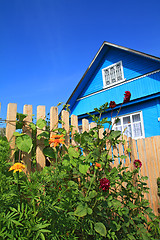 Image showing blue rural house on celestial background 