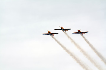 Image showing three planes in cloudy sky