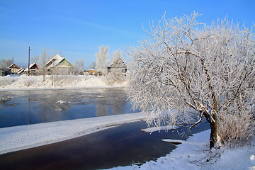 Image showing winter ice on river near villages