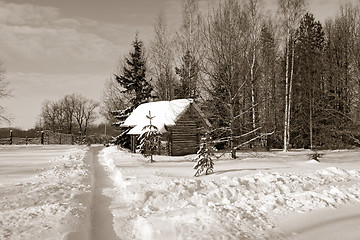 Image showing rural house near snow lane, sepia
