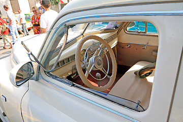 Image showing old car on town street