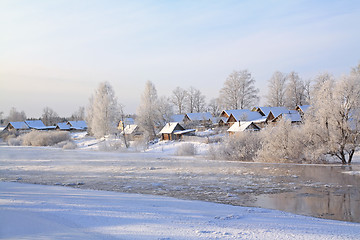 Image showing winter ice on river near villages