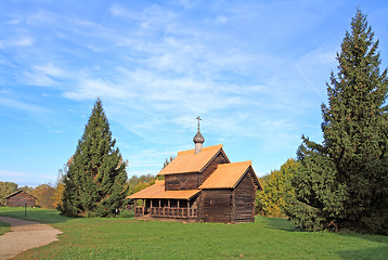 Image showing aging wooden chapel in village