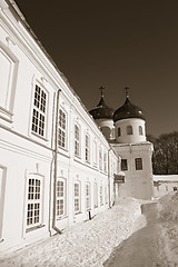 Image showing christian orthodox male priory amongst snow, sepia